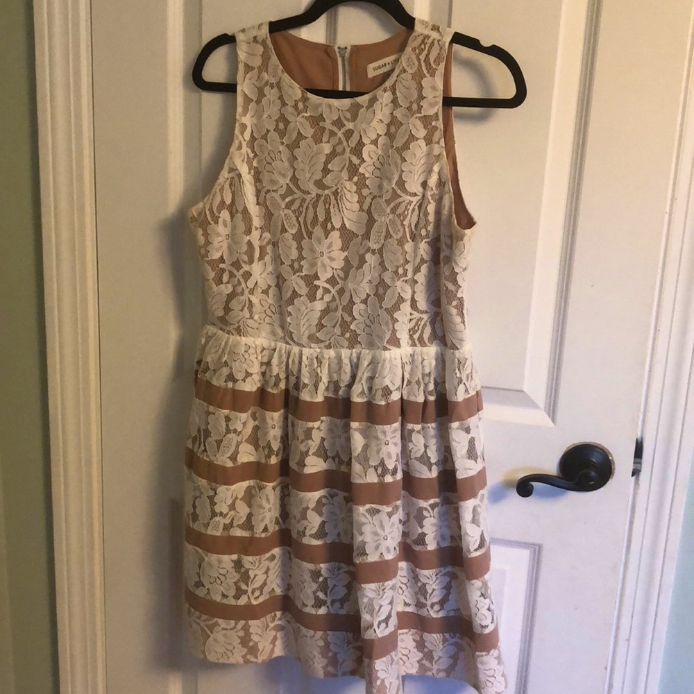 White and tan lace peplum dress